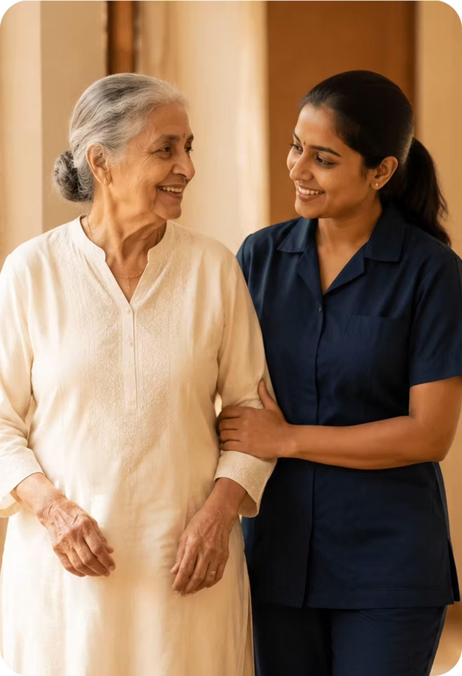 A caregiver walking arm-in-arm with a senior woman at home