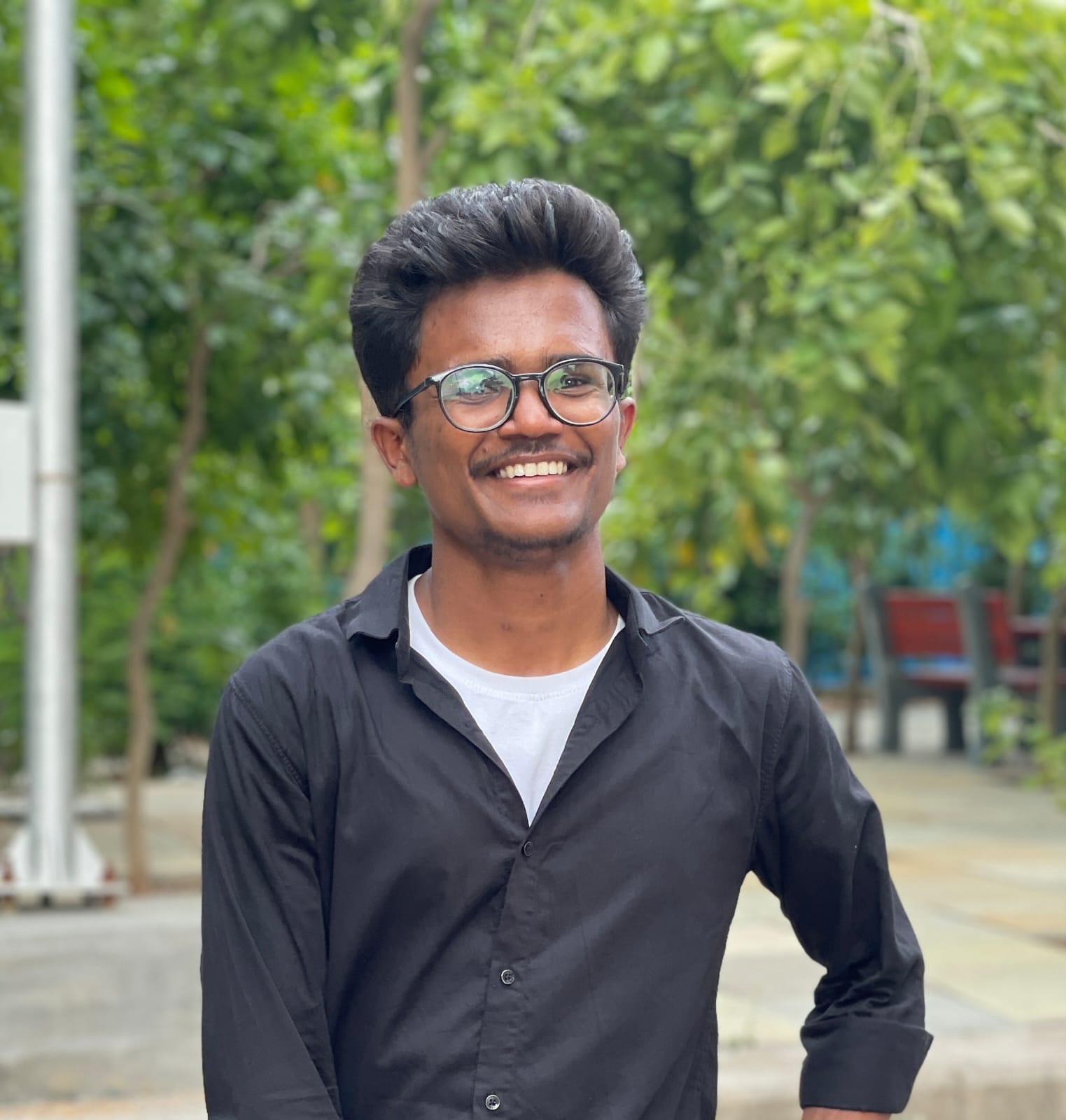 Portrait of Poorna Chandu, UI/UX Designer
